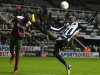 Maritimo's Rosario challenges Newcastle United's Ba during their Europa League soccer match in Newcastle