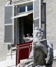 Pope Benedict XVI greets the faithful from his studio's window overlooking St.Peter's square at the end of the Angelus noon prayer, at the Vatican, Sunday, Feb. 10, 2013. (AP Photo/Gregorio Borgia)