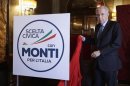 Outgoing Italian PM Monti unveils the symbol of his party reading "Civil choice with Monty for Italy" during a news conference in Rome