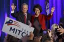 Senate Minority Leader Mitch McConnell of Ky., joined by his wife, former Labor Secretary Elaine Chao, celebrates with his supporters at an election night party in Louisville, Ky.,Tuesday, Nov. 4, 2014. McConnell won a sixth term in Washington, with his eyes on the larger prize of GOP control of the Senate. The Kentucky Senate race, with McConnell, a 30-year incumbent, fighting off a spirited challenge from Democrat Alison Lundergan Grimes, has been among the most combative and closely watched contests that could determine the balance of power in Congress. (AP Photo/J. Scott Applewhite)