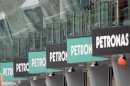 Petronas advertising boards are seen near the grandstand ahead of the Malaysian F1 Grand Prix at the Sepang circuit outside Kuala Lumpur