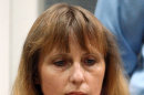 In this March 3, 2004 file photo, accused Michelle Martin, ex-wife of convicted rapist Marc Dutroux, attends a hearing at the Palace of Justice in Arlon, South East Belgium. Belgium's highest court on Tuesday Aug. 28 2012 granted conditional early release to one of the nation's most despised criminals, the accomplice and former wife of a pedophile and child killer, even though she let two of his victims starve to death. Martin can leave prison under strict conditions after serving more than half of her sentence, and will work in a Belgian convent. (AP Photo/Yves Logghe, file)