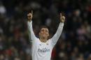 Real Madrid's Cristiano Ronaldo,left, celebrates after scoring his side's fifth goal during the Spanish La Liga soccer match between Real Madrid and Espanyol at the Santiago Bernabeu stadium in Madrid, Sunday, Jan. 31, 2016. (AP Photo/Francisco Seco)
