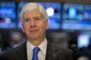 Michigan Governor Rick Snyder gives an interview on the floor of the New York Stock Exchange
