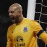Everton's goalkeeper Tim Howard reacts during the English Premier League soccer match against Manchester United at Old Trafford in Manchester