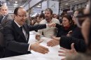 French President Hollande greets visitors at the 50th International Agricultural Show in Paris