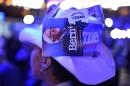 A delegate from Virginia wears a hat supporting Bernie Sanders at the Democratic National Convention on July 26, 2016