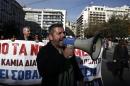 Protesters march during an anti-austerity rally against the government's plans for cutbacks in medical staff and hospitals in Athens