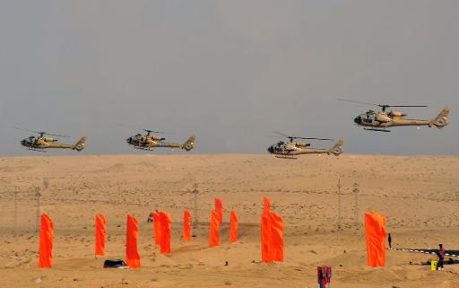 Egyptian military helicopters fly over the eastern Sinai Peninsula, on October 18, 2012