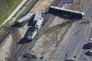 An aerial view shows the scene of a double-decker Metrolink train derailment in Oxnard, California