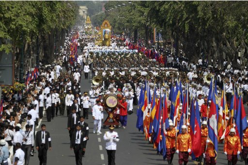 The coffin with remains of Cambodia's late former King Sihanouk is transported by chariots as funeral procession through Phnom Penh begins