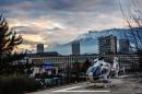 A helicopter is parked in front of the emergency department of the Centre Hospitalier Universitaire hospital in Grenoble, French Alps, on December 29, 2013 where Formula One legend Michael Schumacher is receiving treatment after a ski accident