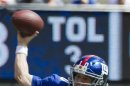 New York Giants Eli Manning passes against Tampa Bay Buccaneers in NFL game in East Rutherford
