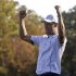 Team Europe golfer Kaymer celebrates winning his match against U.S. golfer Stricker to retain the Ryder Cup for Europe on the 18th green during the 39th Ryder Cup singles golf matches at the Medinah Country Club