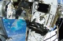 Spacewalking Astronauts Fix Space Station With Toothbrush
