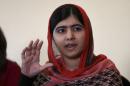 Pakistani schoolgirl activist Malala Yousafzai speaks during a meeting with the leaders of the #BringBackOurGirls Abuja campaign group, in Abuja