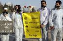 Jordanian Greenpeace activists protest outside the premier's office in Amman on October 30, 2011 against the country's official resolution to establish a nuclear reactor for peaceful purposes