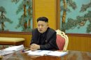 North Korean leader Kim Jong-Un presides over a consultative meeting with officials about state security and foreign affairs in this undated recent picture
