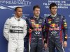 Mercedes Formula One driver Hamilton of Britain, Red Bull Formula One driver Vettel of Germany and Red Bull Formula One driver Webber of Australia look on after the qualifying session of the Australian F1 Grand Prix in Melbourne