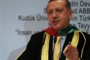 Turkish PM Erdogan addresses the audience after receiving his Honorary Doctorate degree from Al-Quds University in Ankara