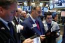S&P hits two-week high on strong earnings; M&A supports