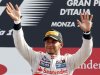 McLaren Formula One driver Hamilton of Britain waves as he celebrates on the podium after winning the Italian F1 Grand Prix at the Monza circuit