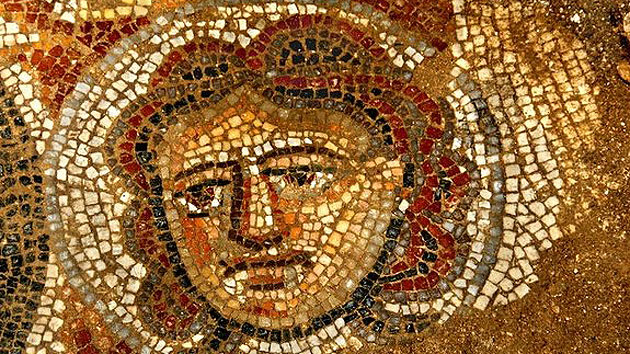 A female face depicted in mosaic on an ancient Jewish synagoge. Archaeologists uncovered this high-quality artwork in June 2012.
