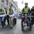 A Boston police officer wheels in injured boy down Boylston Street as medical workers carry an injured runner following an explosion during the 2013 Boston Marathon in Boston, Monday, April 15, 2013. Two explosions shattered the euphoria at the marathon's finish line on Monday, sending authorities out on the course to carry off the injured while the stragglers were rerouted away from the smoking site of the blasts. (AP Photo/Charles Krupa)