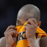 Los Angeles Lakers guard Kobe Bryant wipes his face during the second half in Game 4 of an NBA basketball playoffs Western Conference semifinal against the Oklahoma City Thunder, Saturday, May 19, 2012, in Los Angeles. The Thunder won 103-100. (AP Photo/Mark J. Terrill)