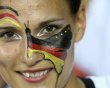 A Germany fan cheers before their Group B Euro 2012 soccer match in Kharkiv