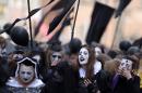 Costumed mourners march on the streets in Gdansk, Poland to mark the 400th anniversary of the death of William Shakespeare