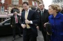 Britain's deputy Prime Minister Nick Clegg arrives to take part in a phone-in show at a radio station in London