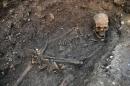This is an undated file photo released by the University of Leicester, England, of remains found underneath a car park in September 2012 in Leicester, which have been declared "beyond reasonable doubt" to be the long lost remains of England's King Richard III, missing for 500 years. Since the skeleton of the 15th-century king was discovered, scientists have done numerous studies. Richard's skeleton showed evidence of 11 injuries from medieval weapons noting one of the skull injuries showed a sword had pierced his head entirely. The nine injuries Richard suffered to his head prove the king somehow lost or took off his helmet during the battle at Bosworth Field, against Henry Tudor. (AP Photo/University of Leicester)