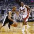 Spurs' Parker drives to the net on Heat's Chalmers during Game 2 of their NBA Finals basketball playoff in Miami