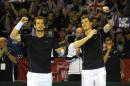 Britain's Andy Murray (L) and Jamie Murray celebrate after beating Argentina's Juan Martín del Potro and Leonardo Mayer in a Davis Cup doubles semi-final match at the Emirates Arena in Glasgow Scotland on September 17, 2016