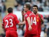 Liverpool's Jordan Henderson, center, celebrates his goal with his teammates during their English Premier League soccer match against Newcastle United at St James' Park, Newcastle, England, Saturday, April 27, 2013. (AP Photo/Scott Heppell)