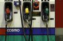 Petrol nozzles are seen at Cosmo Energy Holdings' Cosmo Oil service station in Tokyo