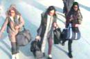 A CCTV image received by London's Metropolitan Police (MPS) on February 23, 2015 shows (L-R) British teenagers Amira Abase, Kadiza Sultana and Shamima Begum with their luggage at Gatwick Airport, south of London
