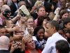 A copy of U.S. President Barack Obama's book "The Audacity of Hope" is held by a supporter looking for an autograph during a campaign rally at George Mason University in Fairfax