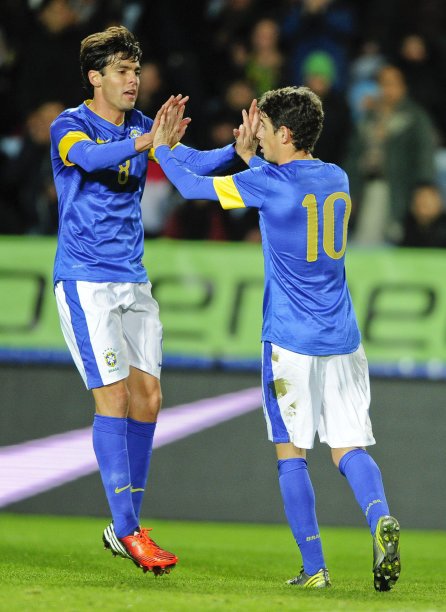 Brazil's Kaka celebrates with Oscar after Oscar's goal in their international friendly soccer match against Iraq in Malmo