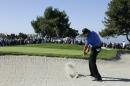 Phil Mickelson hits out of a bunker on the 14th hole of the North Course at Torrey Pines during the second round of the Farmers Insurance Open golf tournament Friday, Feb. 6, 2015, in San Diego. (AP Photo/Gregory Bull)