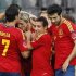 Spain's players celebrate after Torres scored the first goal against South Korea during their friendly soccer match in Bern