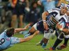 Aplon of South Africa's Stormers is tackled by McKibbin of Australia's New South Wales Waratahs during their Super Rugby union match in Cape Town