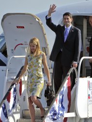 Republican vice presidential candidate Paul Ryan and his wife Janna arrive at Huntsville International Airport to attend a fund raising event in Huntsville, Ala Friday morning Oct. 26, 2012. (AP Photo/The Huntsville Times, Bob Gathany)