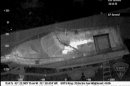 The boat in which Boston Marathon bombing suspect Dzhokhar Tsarnaev hid is seen from the Forward Looking Infrared setting of a police helicopter on April 19.