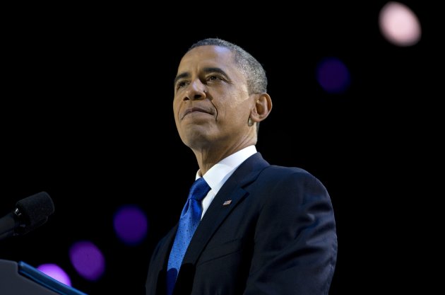 Re-elected Barack Obama addresses his supporters on election night in Chicago (PA)
