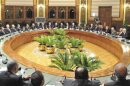 Egypt's interim President Mansour and his minsters meet with newly-appointed governors at El-Thadiya presidential palace in Cairo