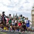 Athletes run near Big Ben during the men's marathon at the 2012 Summer Olympics, at the 2012 Summer Olympics, London, Sunday, Aug. 12, 2012. (AP Photo/Luca Bruno)
