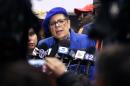 FILE- In this March 23, 2016, file photo, Chicago Teachers Union president Karen Lewis speaks at a news conference in Chicago. The Chicago Teachers Union said on Saturday, April 16, 2016, the countdown toward a possible strike had begun after it rejected the recommendation of a neutral arbitrator that it accept a contract offer from the nation's third-largest school system. (AP Photo/Nam Y. Huh, File)