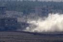 Smoke rises during fighting between the Islamic State and Kurdish forces in an eastern Kobani neighbourhood